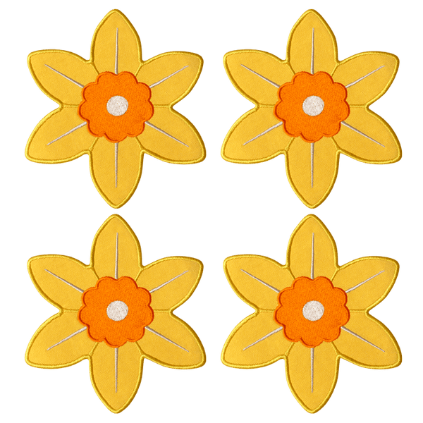 Octaevo’s Daffodil Coasters (Set of 4) bring a cheerful touch to any table setting.