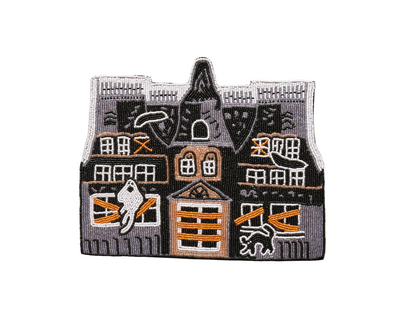 Embroidered patch of a haunted house with cats on a gray background