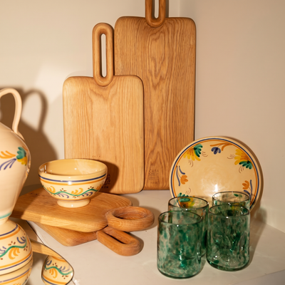 table set wood board, deflated glasses and bowl - lifestyle