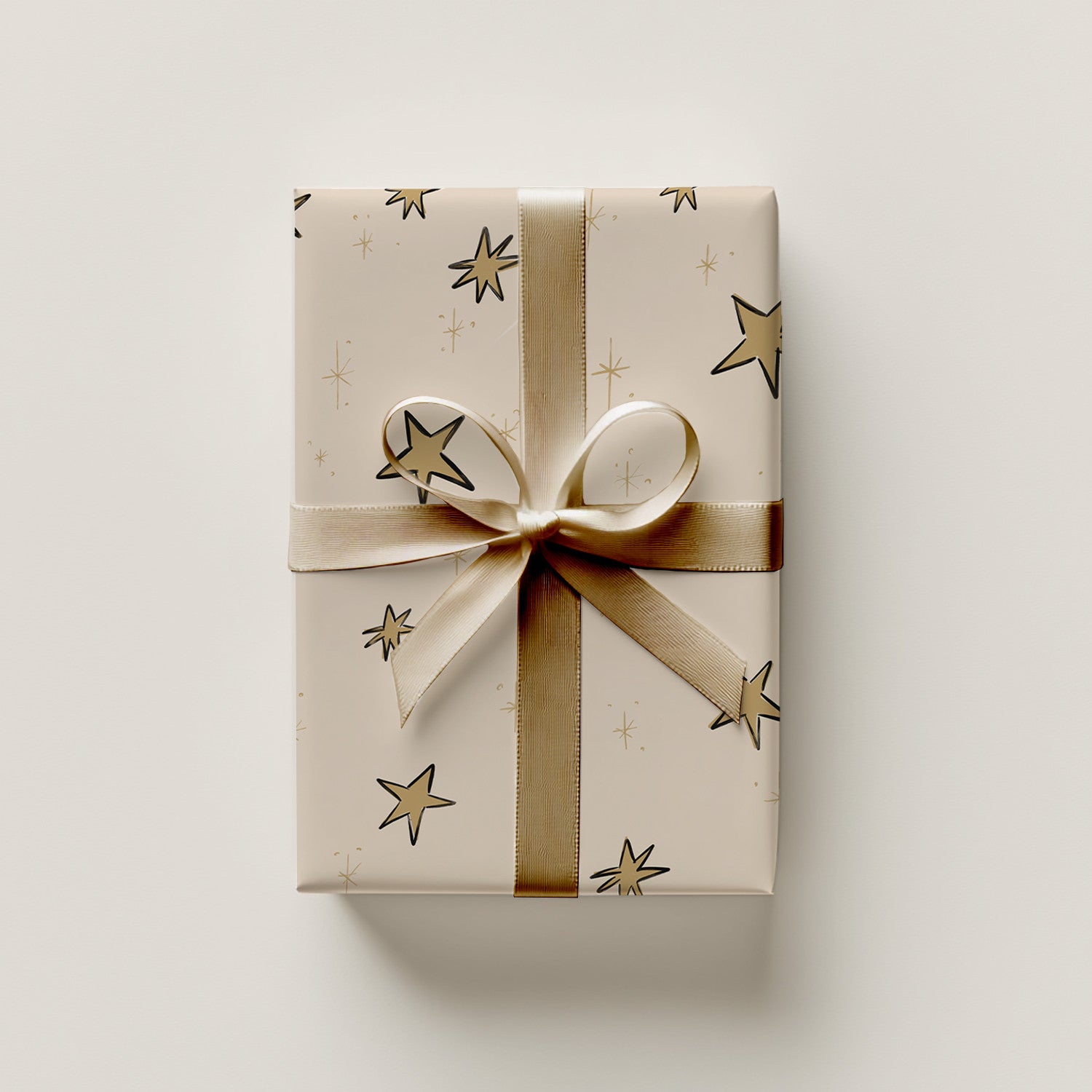 8. Star Gift Wrap Gold Bow.jpg