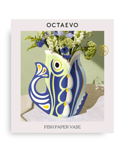 Blue Fish-shaped paper vase with floral arrangement on an OCTAEVO packaging. 