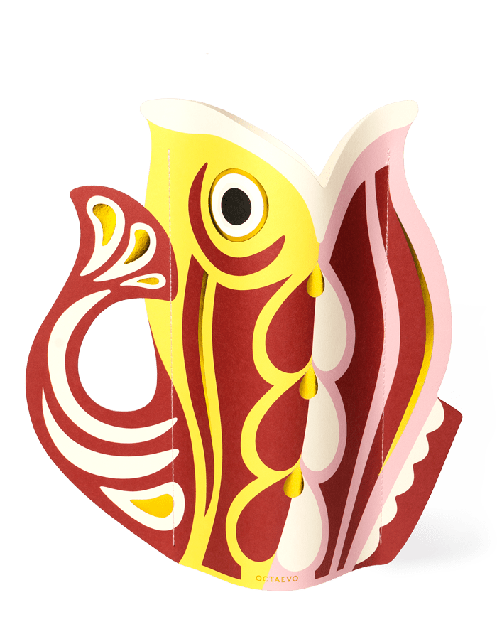 The Fish Paper Vase by OCTAEVO in red is a colorful, abstract centerpiece inspired by the Mediterranean.