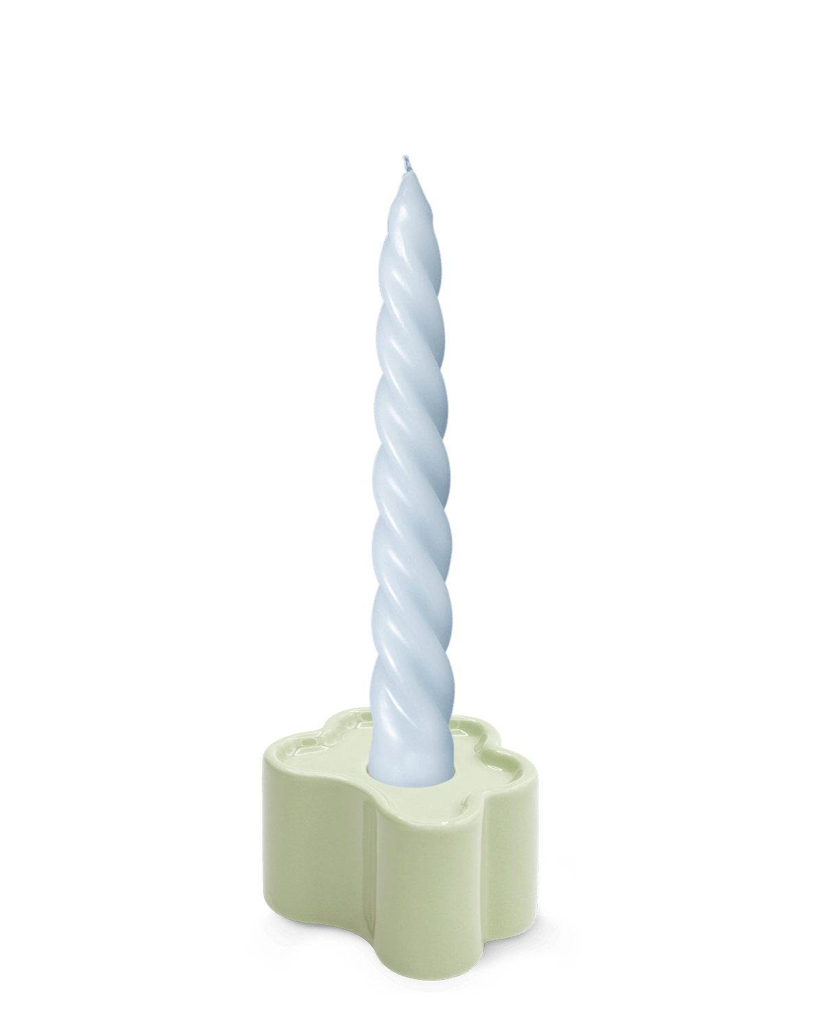 A light blue twisted candle in OCTAEVO's Flora Candle Holder in Mint, a hand-glazed ceramic flower shape, on white background.