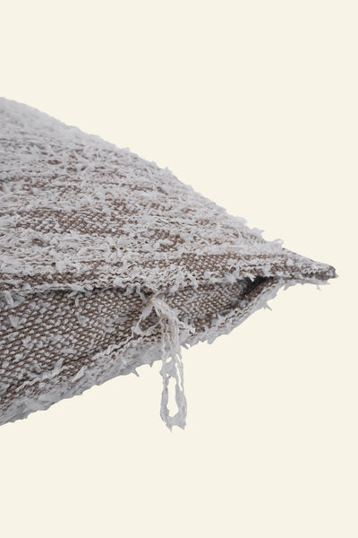 detail of beige fuzzy knit pillowcase in organic cotton and recycled polyamide