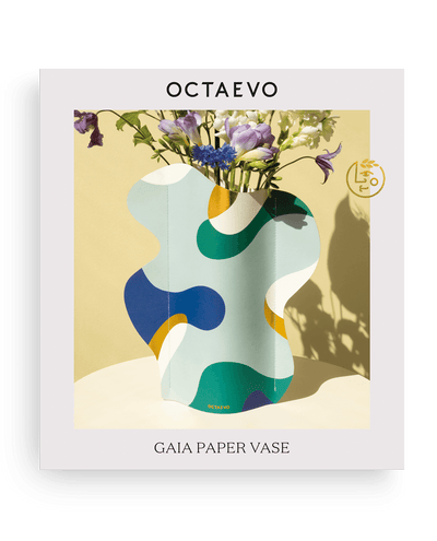 Gaia Paper Vase by Octaevo—abstract, colorful, water resistant, nature-inspired decor with flowers on yellow background.