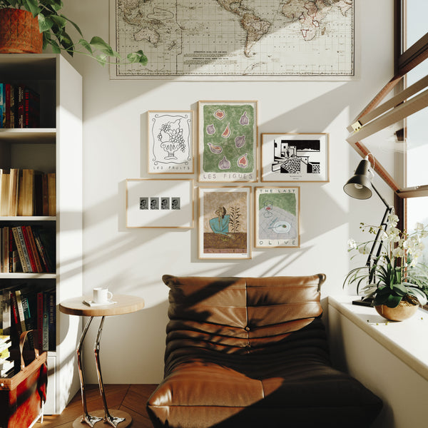 modern German apartment with a brown couch and a small gallery wall 