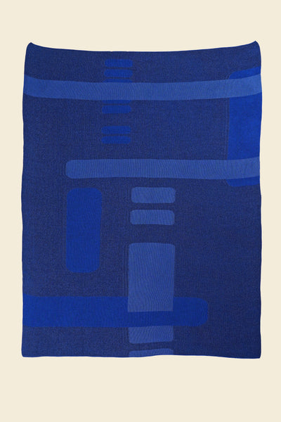 laid flat blue geometric column knit blanket in merino wool and organic cotton