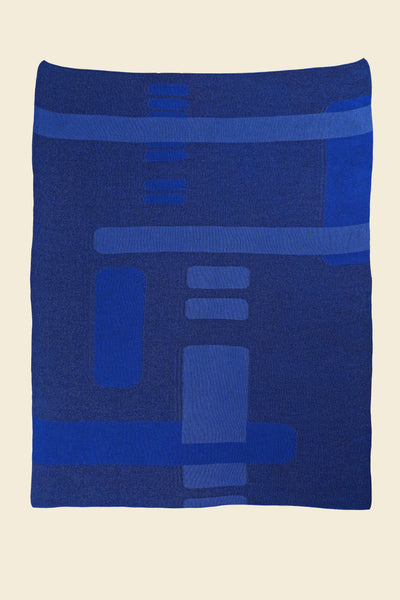 laid flat blue geometric column knit blanket in merino wool and organic cotton