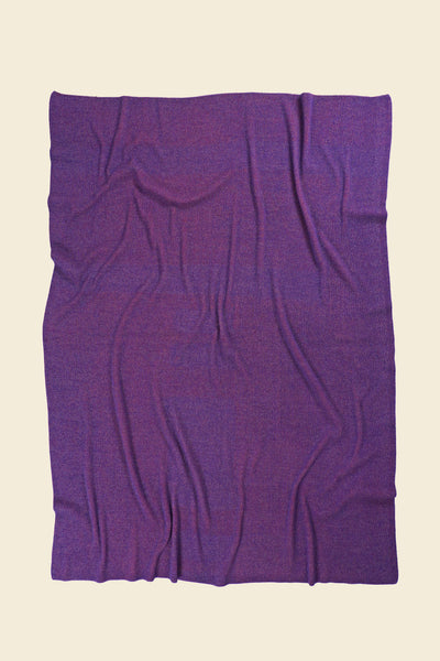 back side of pink geometric column knit blanket in merino wool and organic cotton