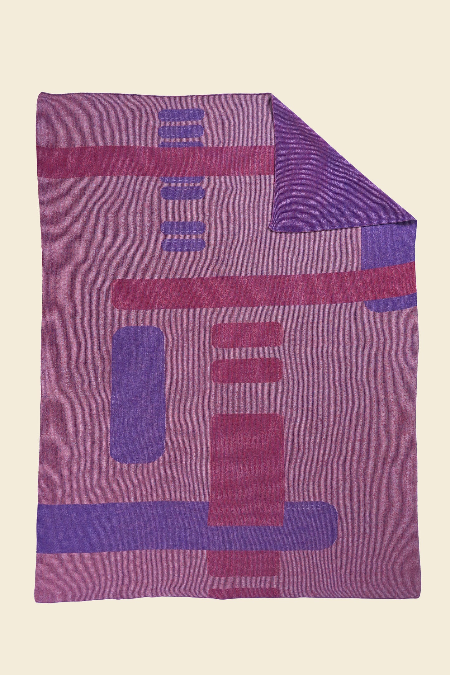 pink geometric column knit blanketwith flipped corner in merino wool and organic cotton