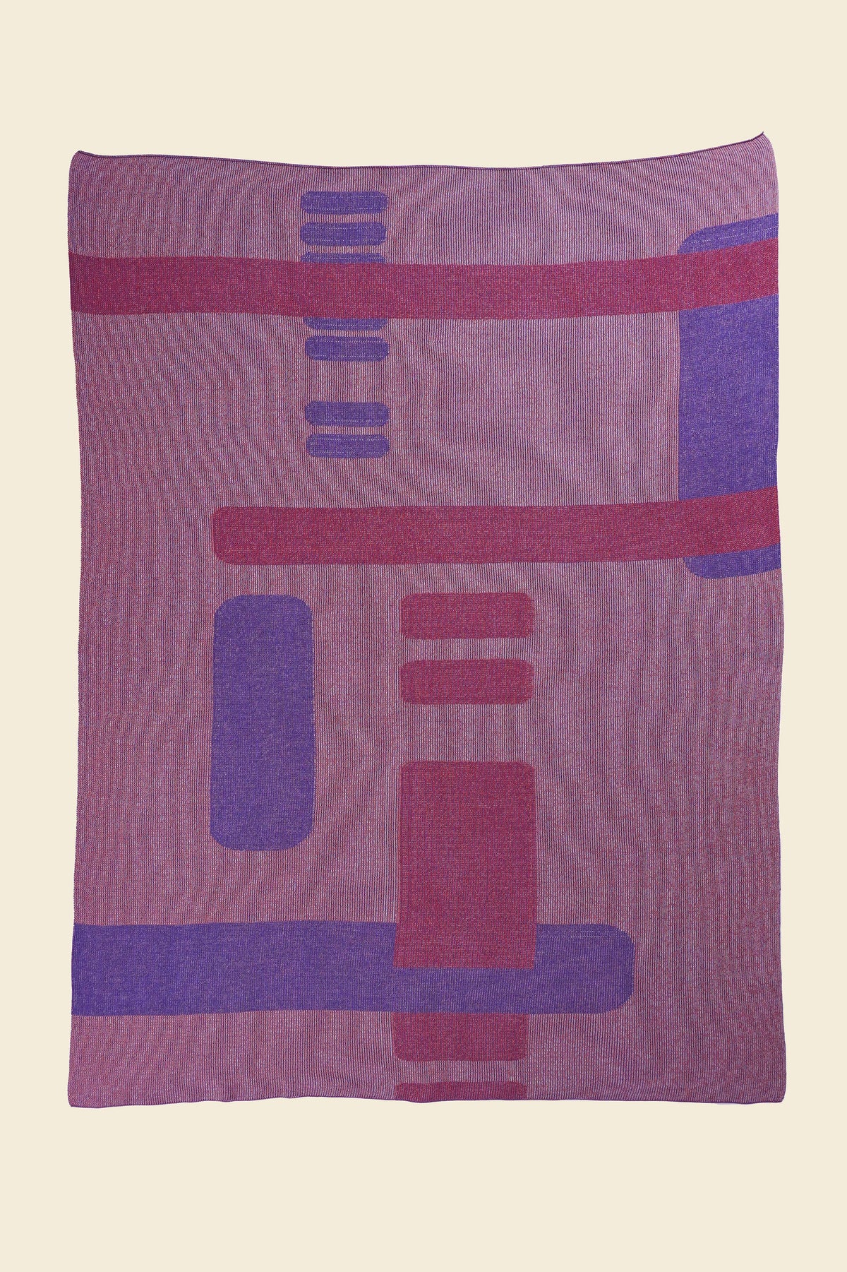 laid flat pink geometric column knit blanket in merino wool and organic cotton