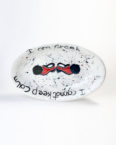 Decorative ceramic platter with hand painted  tharouchi on a white background