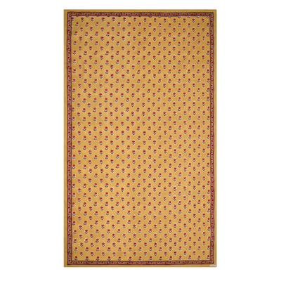 A rectangular tablecloth with a golden yellow base and small floral motifs, with a decorative border.