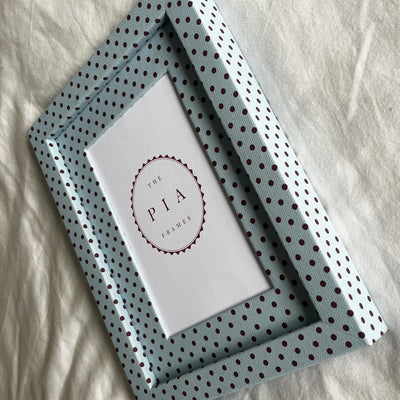 Side view of handmade blue and burgundy Pembroke polka dot fabric picture frame, showcasing its design and depth