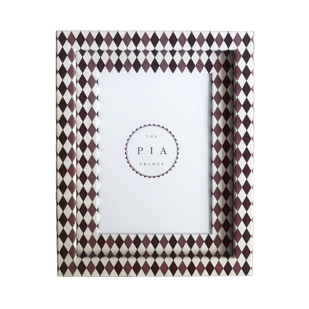 Handmade burgundy, blush and white harlequin fabric frame, on a white linen fabric