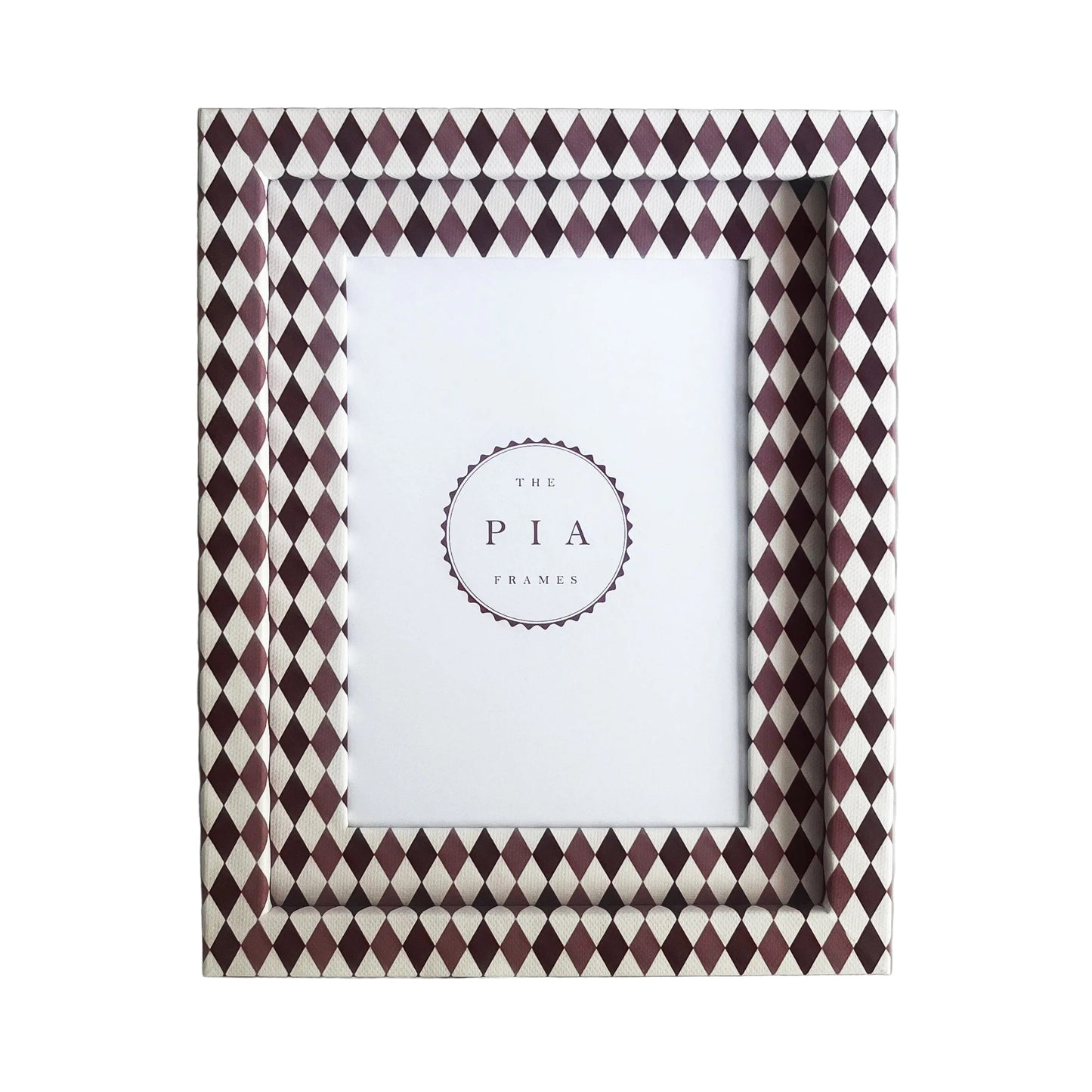 Handmade burgundy, blush and white harlequin fabric frame, on a white linen fabric