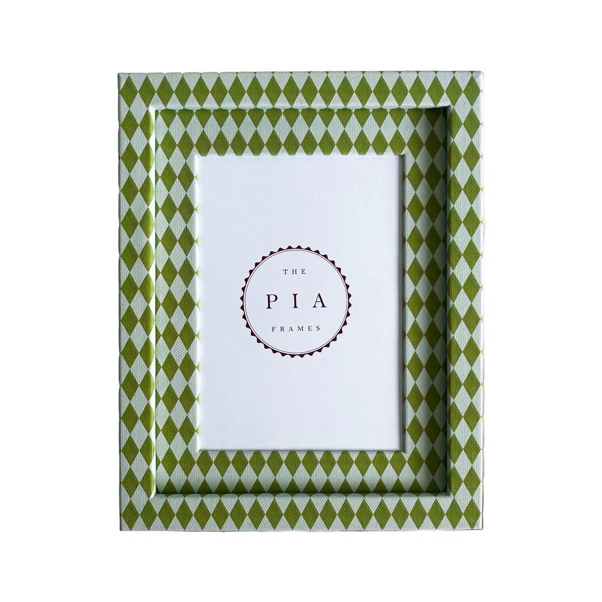 Hand wrapped chartreuse and blue harlequin fabric frame, on a white linen background