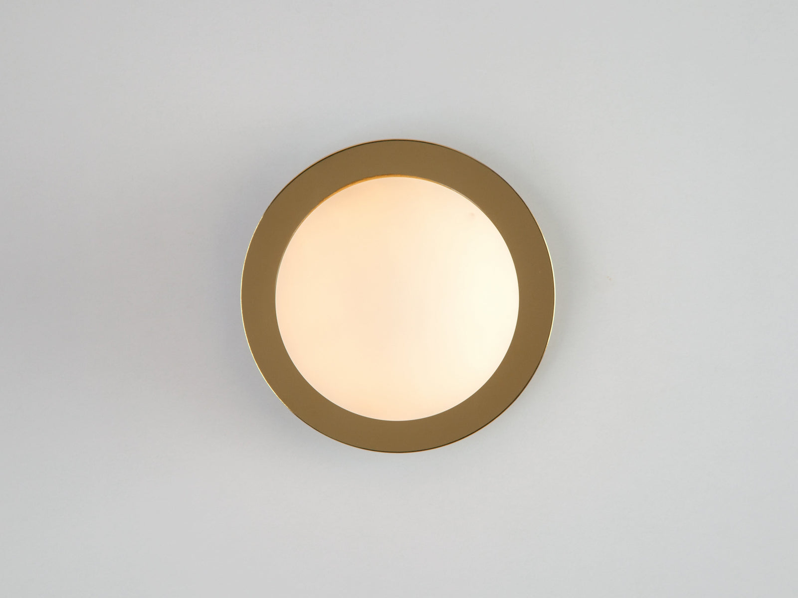Brass opal disc wall light