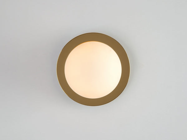 Brass opal disc wall light