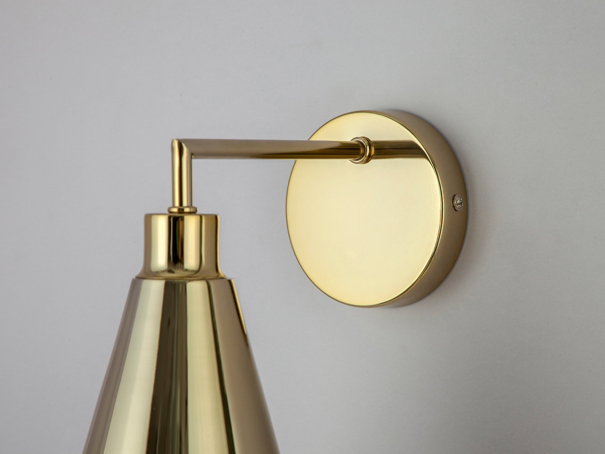 Brass cone shade wall light