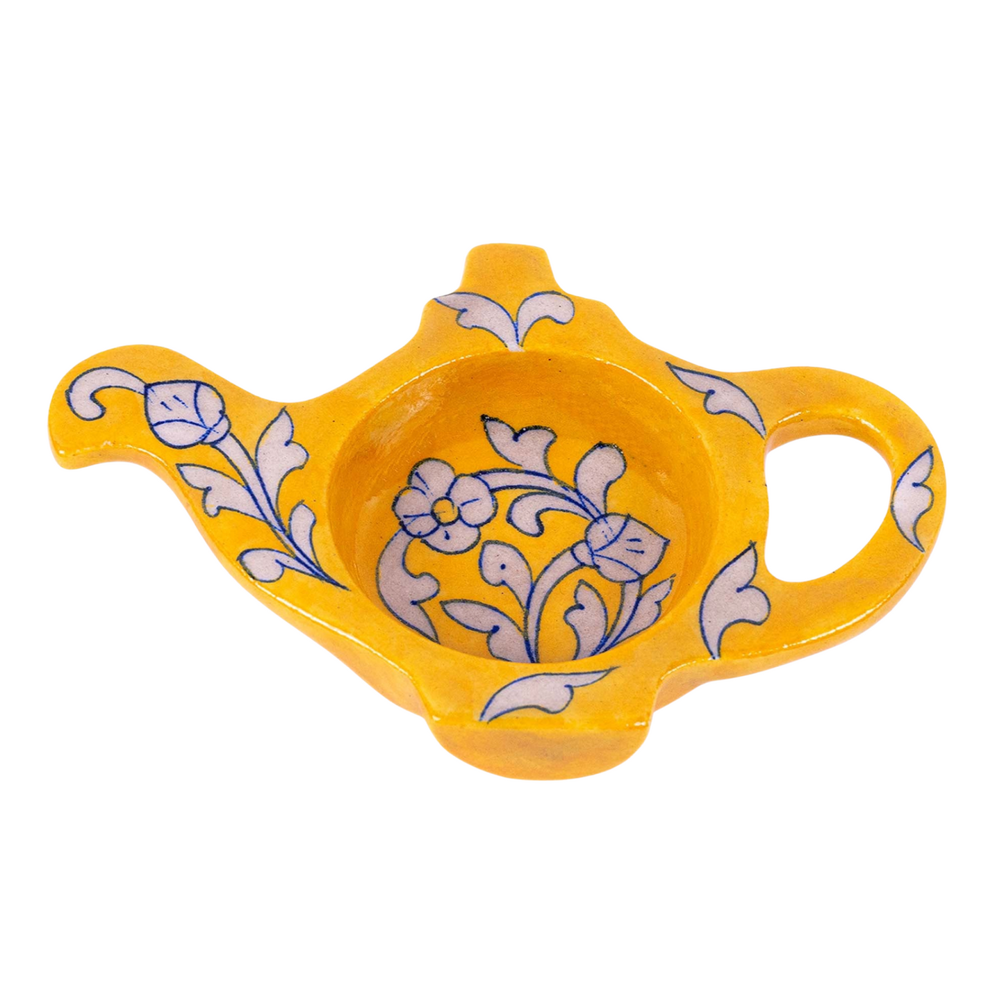 A yellow and white floral vine-patterned Jaipur Blue Pottery tea bag holder shaped like a teapot.