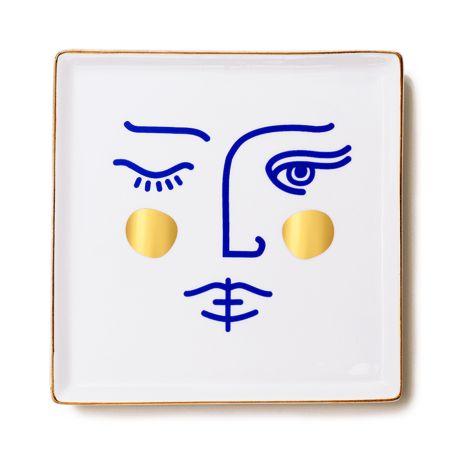 OCTAEVO Janus Goddess Ceramic Tray: square white ceramic with minimalist blue face and gold circle cheeks.