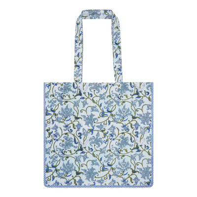 A block printed cotton tote bag with contrast trim and a botanical design