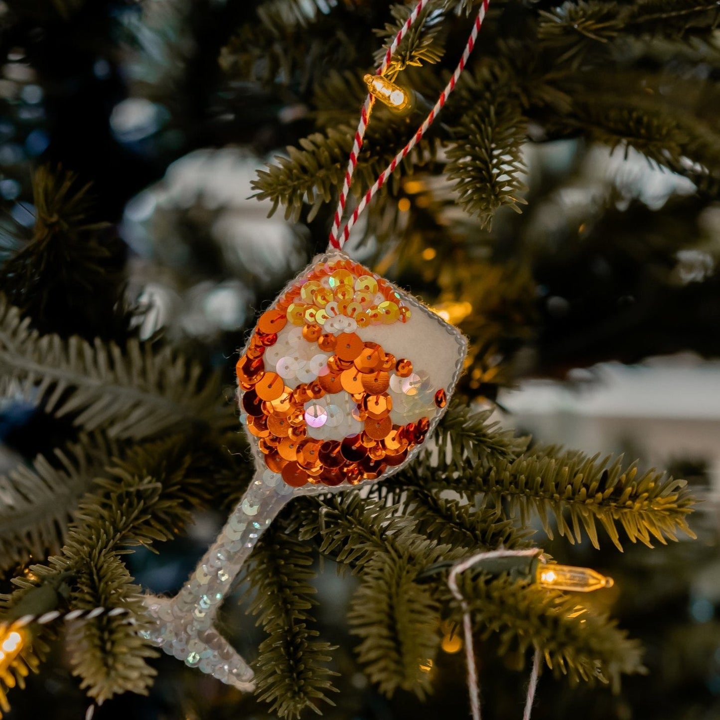 A Summer Spritz in a Glass ornament, sequinned on a tree