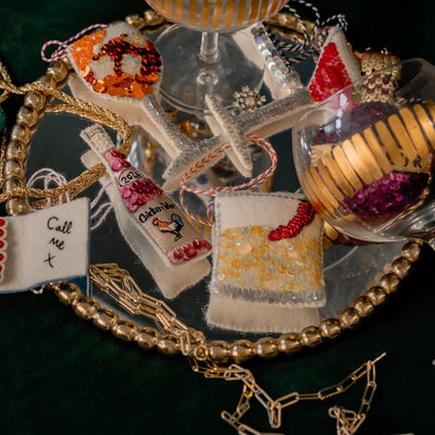 A collection of sequinned ornaments of drinks