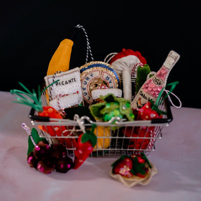 A shopping basket containing sequinned groceries