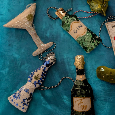 A collection of green and blue sequinned ornaments