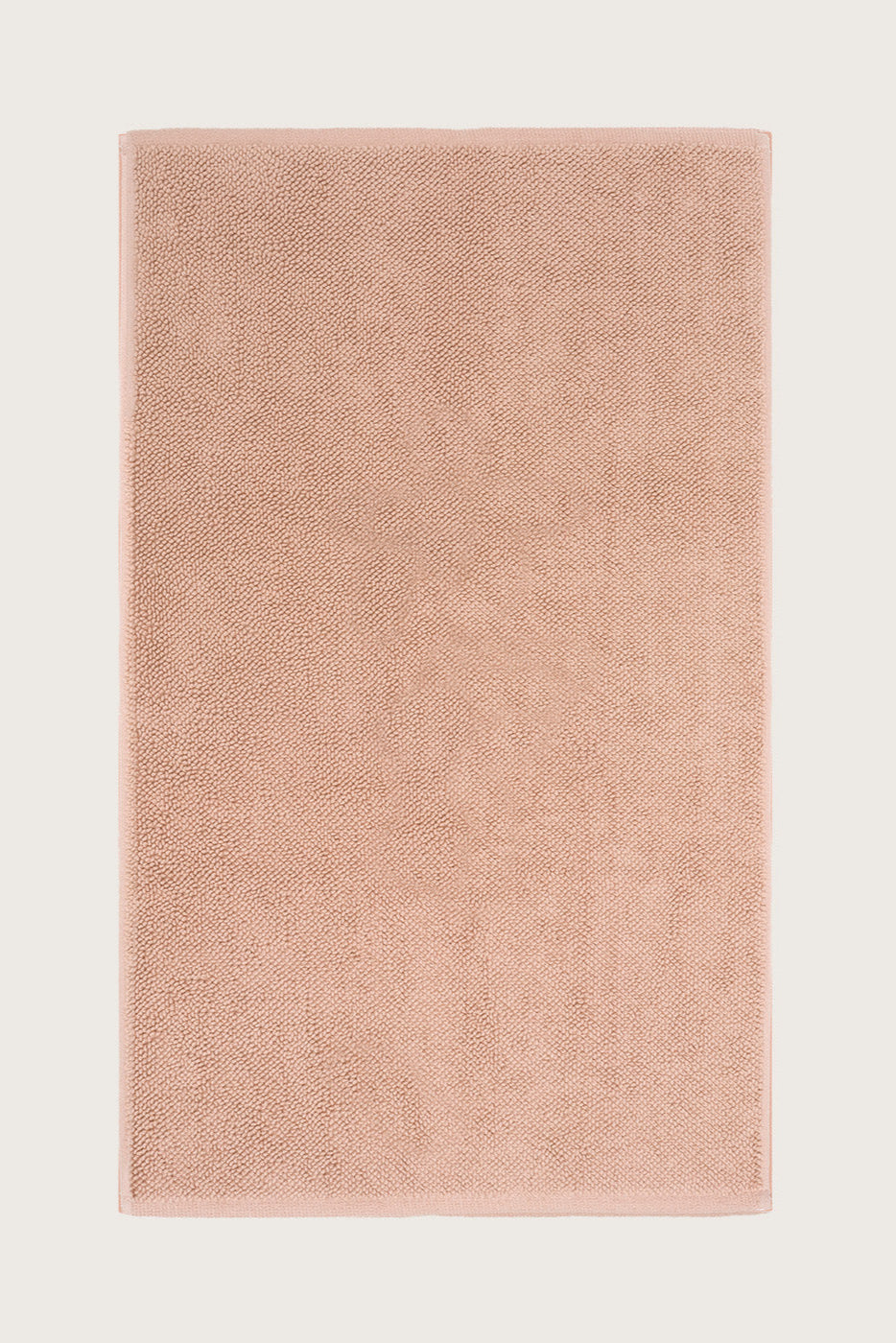 Købn Tahini  Bathmat with a plush pile cotton weave laid flat