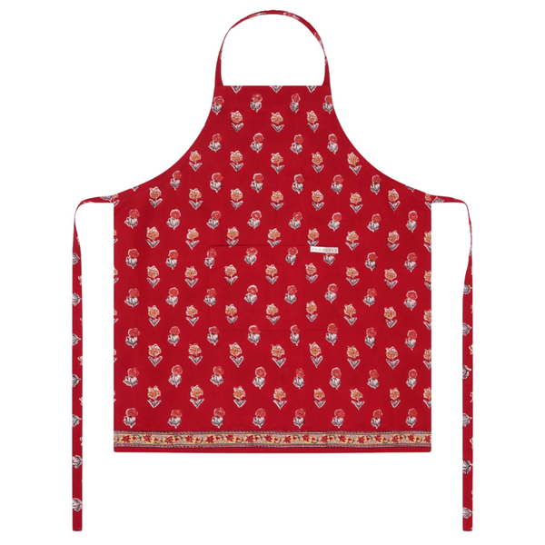 Red block printed apron with a floral pattern on a white background