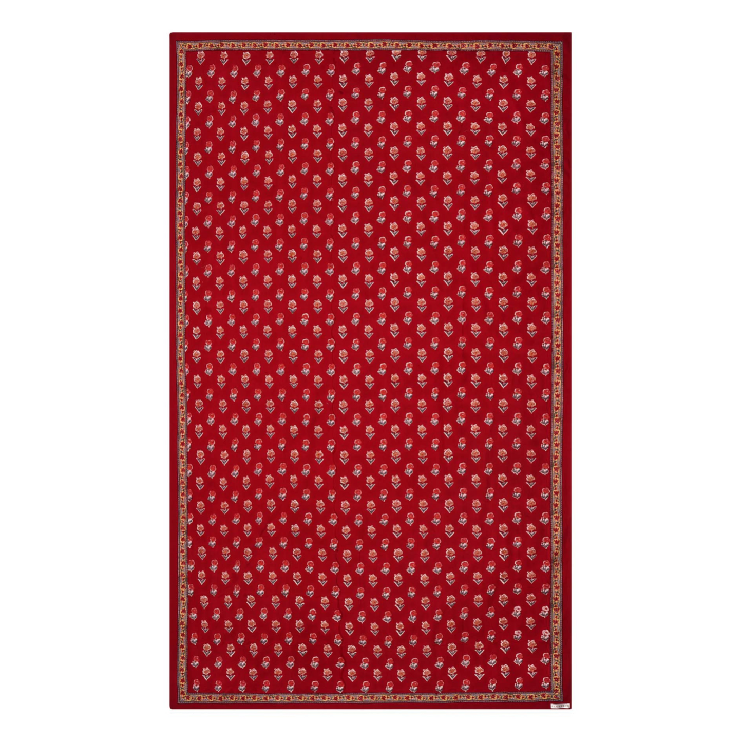 A red floral block printed tablecloth with a border