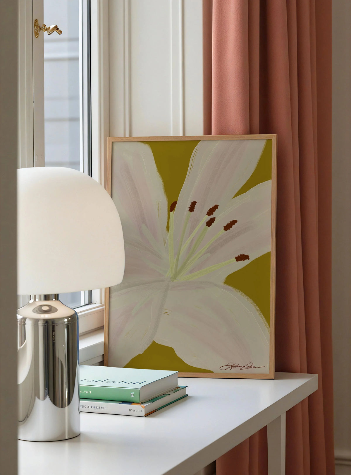 lilliesFrame-On-Shelf-Next-to-Chrome-Lamp.jpg