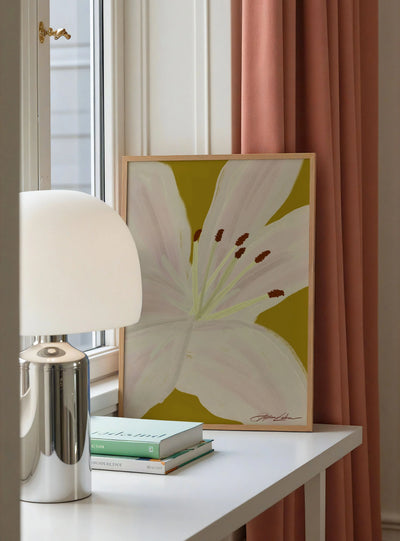lilliesFrame-On-Shelf-Next-to-Chrome-Lamp.jpg