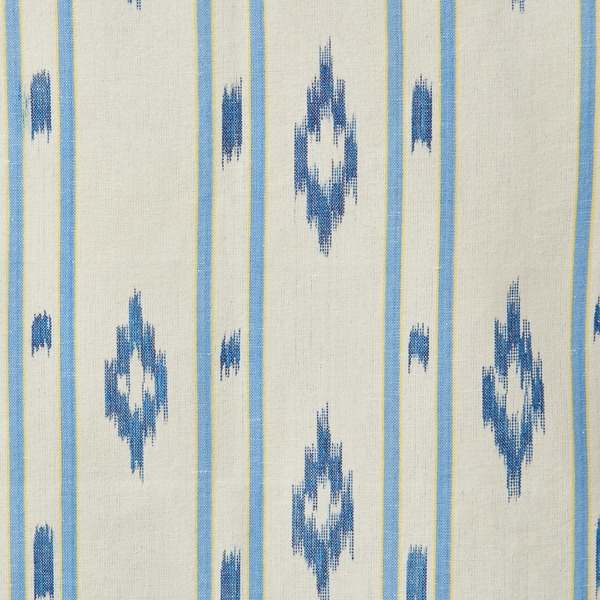 Textile pattern with blue geometric shapes on a beige background