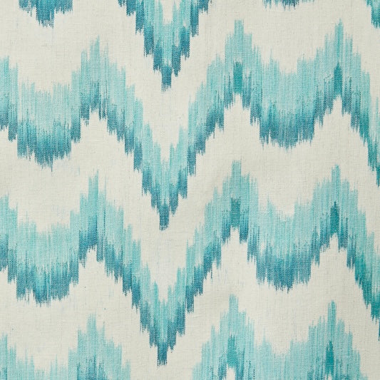 Textured fabric pattern with blue and white zigzag design