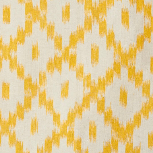 Yellow and white patterned fabric texture