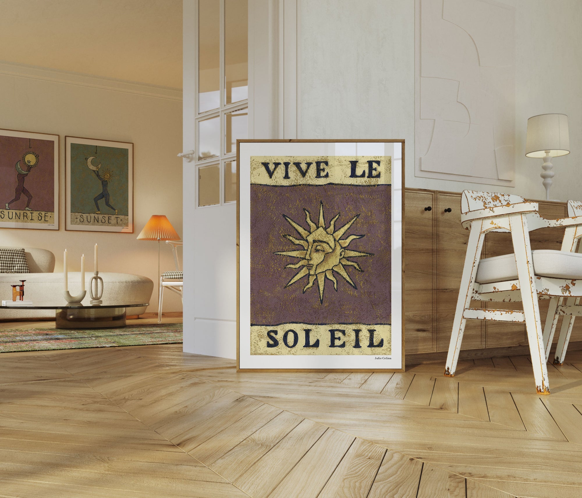 modern livingroom with natural materials and big art prints featuring stylized suns and moons
