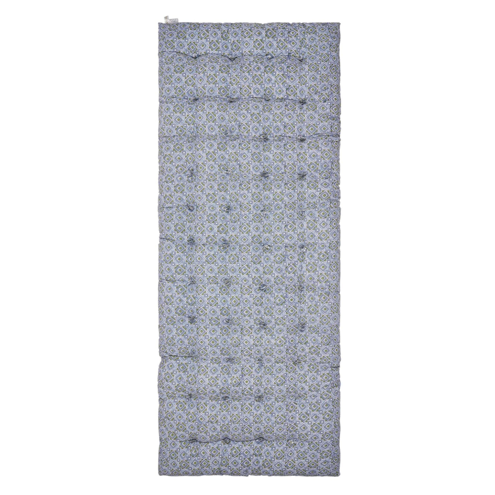 Floral patterned block print mattress on a white background