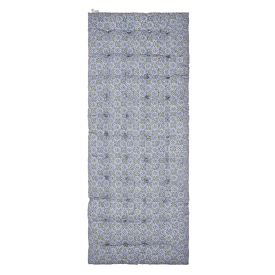 Floral patterned block print mattress on a white background