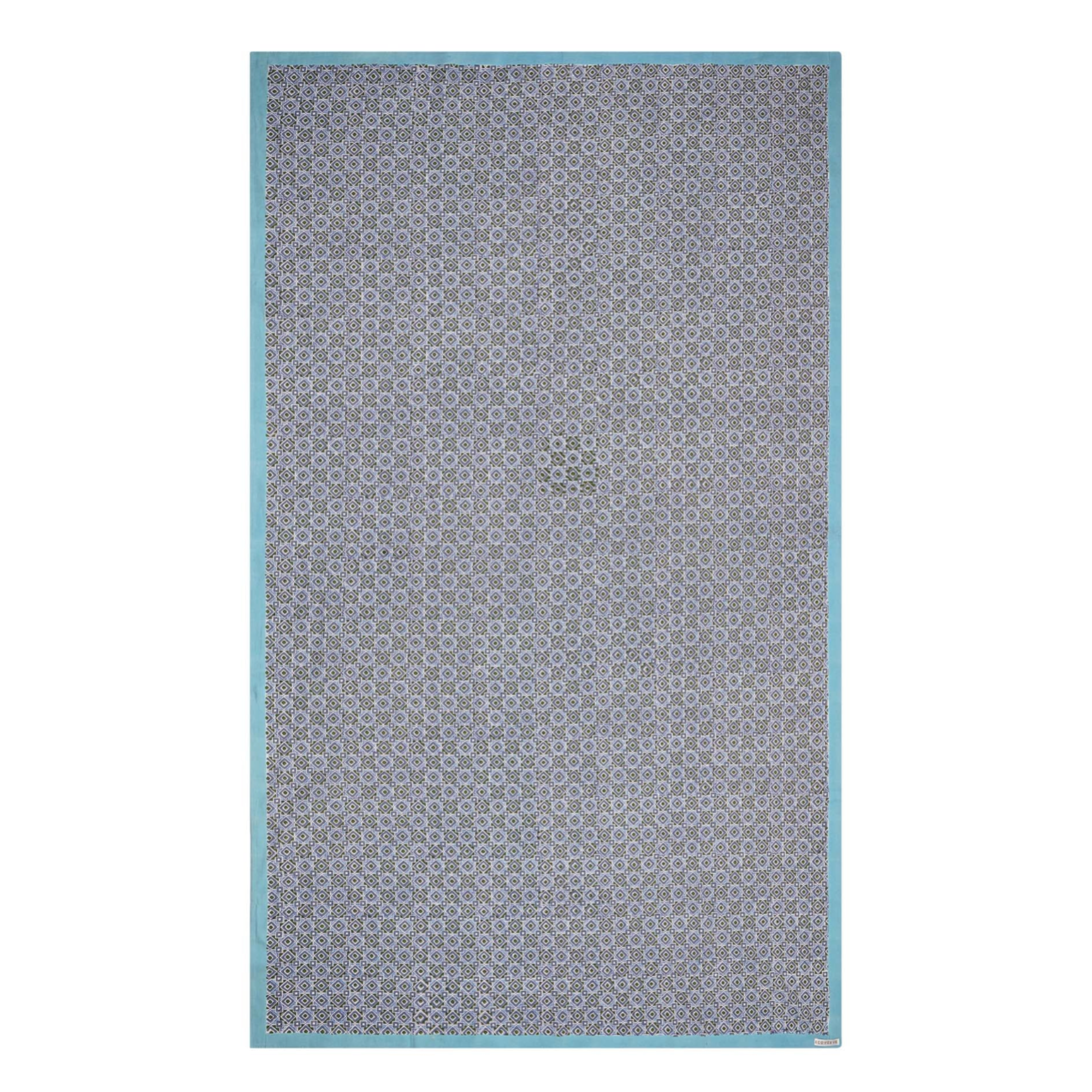 A rectangular tablecloth with a geometric pattern in shades of blue and green, with a solid white border.