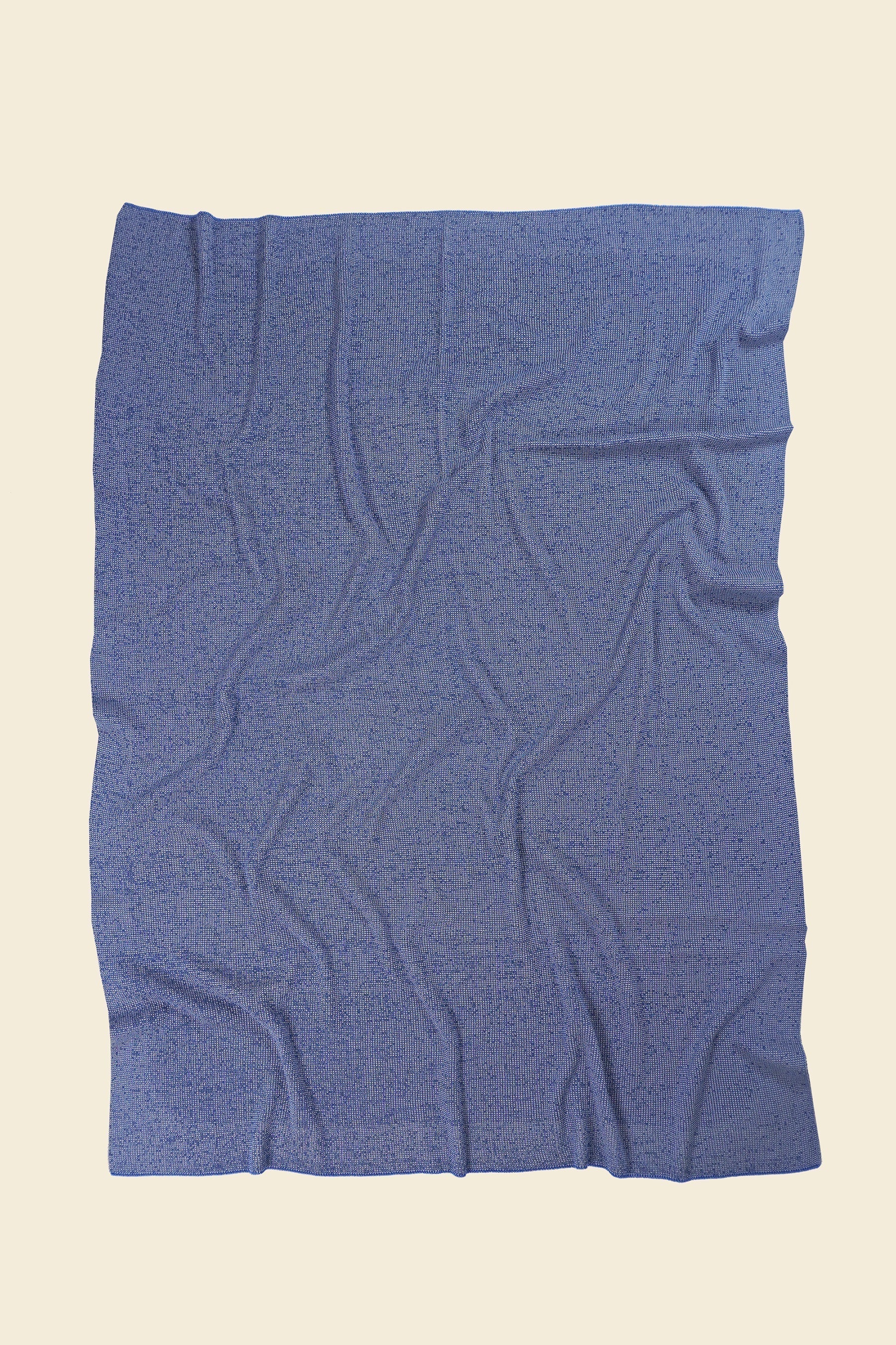 back side grey/blue knit blanket in merino wool and organic cotton