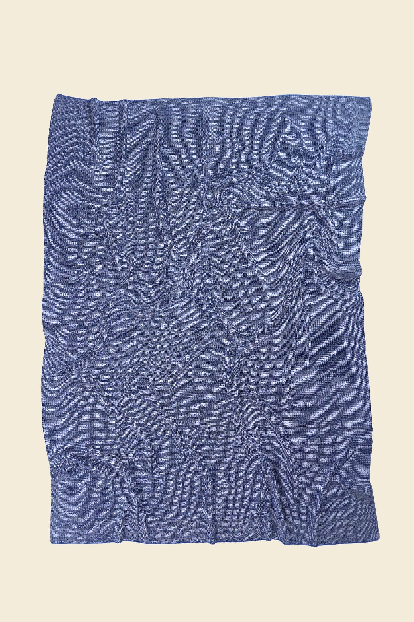 back side grey/blue knit blanket in merino wool and organic cotton