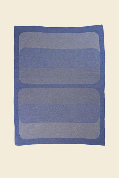 laid flat grey/blue knit blanket with rectangles in merino wool and organic cotton