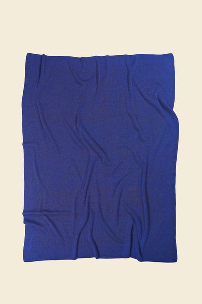 back side of purple/blue knit blanket in merino wool and organic cotton