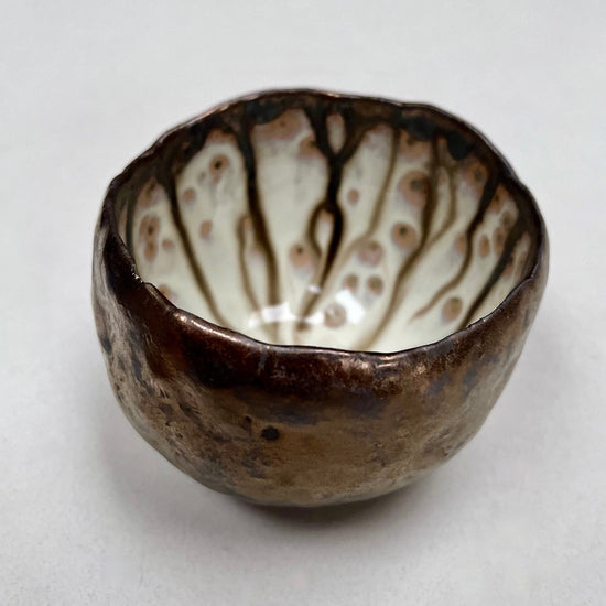 Handmade Gold Ceramic Ring Bowl with Swirly Dripped Glaze