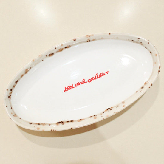 Hand-painted “sex and caviar” Dish
