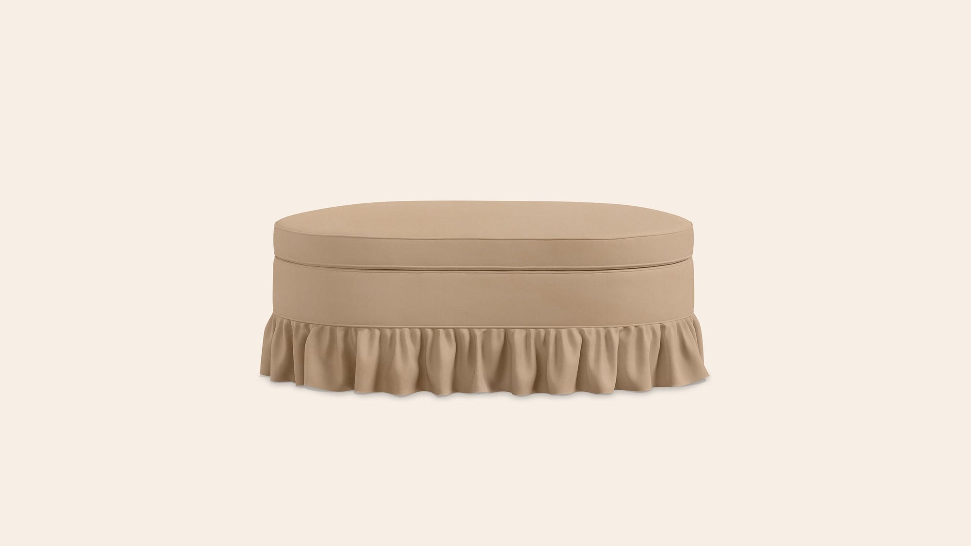 Beige ottoman with ruffled fringe skirt